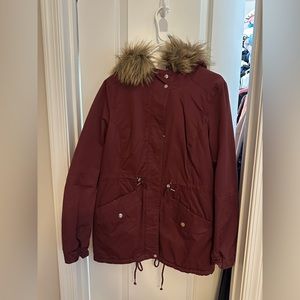 Red jacket with fur hood from H&M